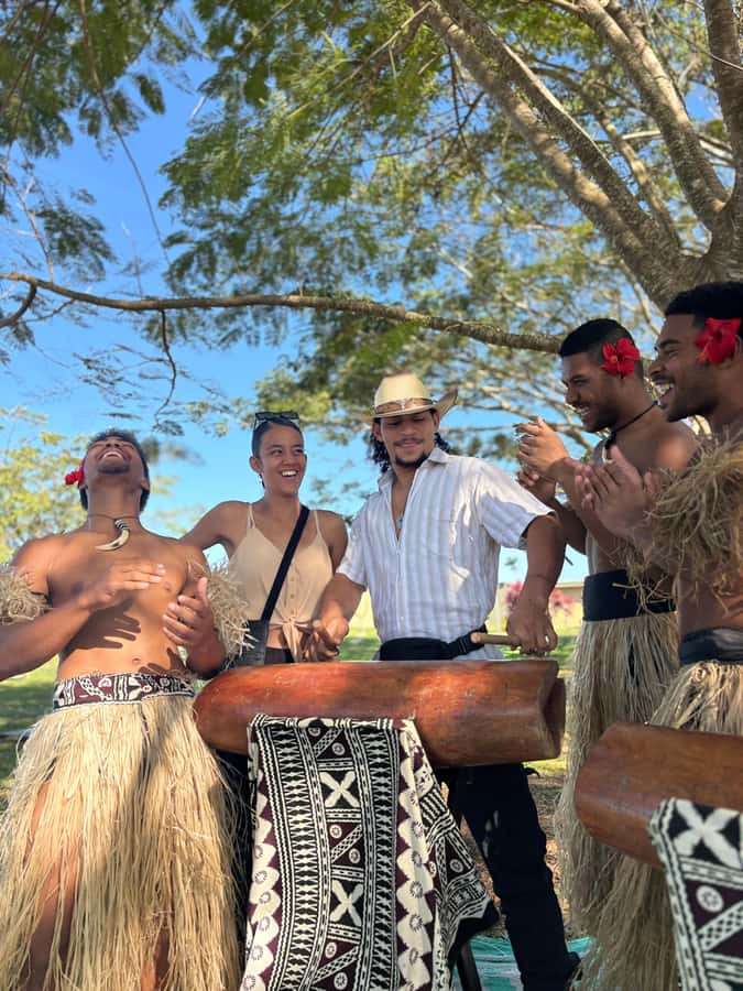 Nadi: VOU Evening Dinner and Show Experience - Arriving at the VOU HUB with drums and a sunset