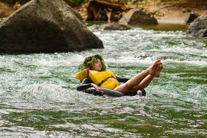 River Tubing Fiji, Navua River - Swimming beneath a Navua River waterfall