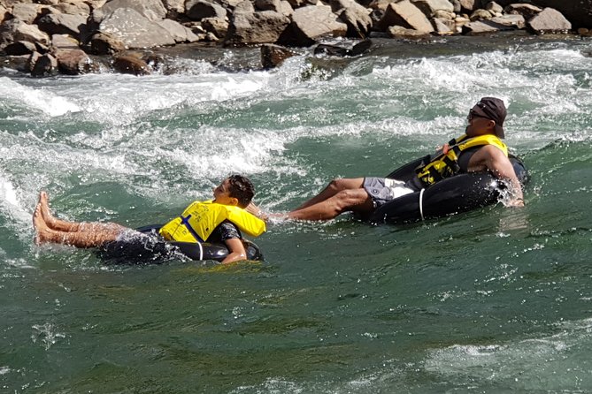 River Tubing Fiji, Navua River - Tubing downstream through gentle rapids